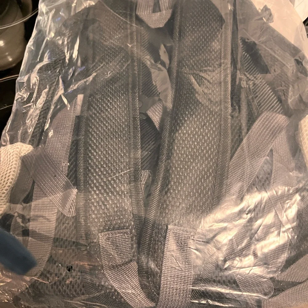 Portable new doggie backpack. Medium dog size. Oxford style. Pockets.Harness